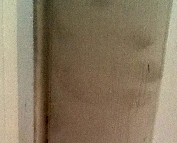 Child-sized fingerprints on doorway where no child lives.